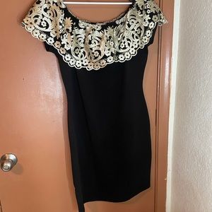 Black and gold women off the shoulder dress